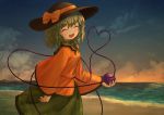  1girl absurdres arm_at_side arm_up beach black_headwear closed_eyes cloud collar commentary cowboy_shot ekaapetto facing_viewer frilled_shirt_collar frilled_sleeves frills gradient_sky green_collar green_hair green_skirt hat hat_ribbon heart heart_of_string highres holding horizon komeiji_koishi long_sleeves mixed-language_commentary ocean open_mouth outdoors ribbon shirt short_hair skirt sky smile solo standing sunset third_eye touhou wide_sleeves yellow_shirt 