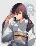  1girl black_hair cowboy_shot floral_background grey_kimono hair_over_shoulder highres japanese_clothes kantai_collection kasumi_(skchkko) kimono long_hair looking_at_viewer nagato_(kantai_collection) obi official_alternate_costume red_eyes sash solo upper_body yukata 