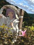  1girl absurdres alternate_hairstyle animal_ears arm_wrap bangs closed_mouth commentary_request day field floppy_ears flower folded_hair forbidden_scrollery forest hat highres japanese_clothes kajatony kimono lily_(flower) looking_to_the_side medicine_seller medium_hair mountain nature outdoors pink_flower purple_hair rabbit_ears red_eyes reisen_udongein_inaba rice_hat smile solo touhou tree upper_body white_kimono 