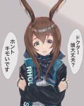  1girl amiya_(arknights) animal_ears arknights black_jacket blue_eyes blue_neckwear brown_hair bunny_ears clothes_writing commentary cravat crossed_arms disgust eyelashes grey_background hair_between_eyes highres hood hooded_jacket insult jacket jewelry kava181 long_hair looking_at_viewer multiple_rings neck_ring open_clothes open_jacket parted_lips ribbed_shirt ring self_hug shirt simple_background solo speech_bubble sweatdrop translated upper_body white_shirt 
