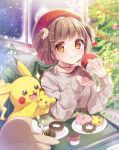  1girl :t blush brown_eyes brown_hair christmas christmas_tree closed_mouth commentary_request cup doughnut earrings eating eyelashes food gen_1_pokemon gen_7_pokemon hat highres indoors jewelry kisukekun long_sleeves looking_at_viewer necklace pikachu plate pokemon pokemon_(creature) red_headwear rowlet short_hair signature snowflakes sparkle sweater tam_o&#039;_shanter 