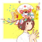  1girl akabeko arrow_(projectile) bangs blush branch brown_eyes brown_hair daruma_doll dice fan fish flower hands_together hands_up highres leaf object_on_head original pink_flower rope shirt short_hair smile solo upper_body white_flower white_shirt yellow_background yoshimon 
