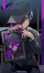  1boy ahoge bangs black_headwear black_jacket black_pants blurry_foreground brown_eyes closed_mouth collared_shirt commentary_request danganronpa_(series) danganronpa_v3:_killing_harmony highres holding huyuharu0214 iei jacket long_sleeves looking_at_viewer male_focus official_alternate_costume pants photo_(object) pink_blood saihara_shuuichi school_uniform shirt short_hair signature sitting smile spoilers striped striped_jacket vertical_stripes x 
