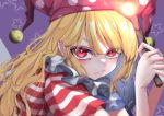  1girl american_flag_dress blonde_hair clownpiece fall_dommmmmer hat highres jester_cap long_hair looking_at_viewer pointy_ears polka_dot red_eyes solo star_(symbol) striped touhou 