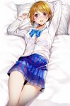  1girl blue_neckwear blue_skirt blush bow bowtie breasts brown_hair commentary_request eyebrows_visible_through_hair highres koizumi_hanayo long_sleeves looking_at_viewer love_live! love_live!_school_idol_project lying medium_breasts nakano_maru on_back open_mouth pillow plaid plaid_skirt purple_eyes school_uniform shirt short_hair skirt solo striped striped_neckwear thighs white_shirt 