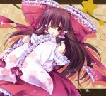  1girl bangs blush bow brown_eyes brown_hair checkered checkered_background detached_sleeves floral_print hair_bow hair_tubes hakurei_reimu hands_up heart heart_print kanna543 large_bow long_hair long_sleeves red_bow red_ribbon red_skirt ribbon ribbon-trimmed_sleeves ribbon_trim skirt sleeve_hold solo sparkle touhou upper_body wide_sleeves yellow_background 