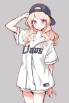  1girl :d absurdres aikatsu!_(series) aikatsu_stars! arm_behind_head arm_up backwards_hat bare_legs baseball_cap baseball_uniform blush cowboy_shot eyebrows_visible_through_hair grey_background grin hair_over_shoulder hat highres kasumi_mahiru light_brown_hair long_hair looking_at_viewer multicolored multicolored_eyes multicolored_hair open_mouth orange_eyes orange_hair oversized_clothes oversized_shirt pinmisil purple_eyes shirt short_sleeves shorts simple_background smile sportswear streaked_hair teeth wavy_hair 