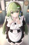  1girl :t alternate_costume apron black_dress black_legwear blurry blurry_background clock commentary dress enmaided eyebrows_visible_through_hair finger_to_cheek frog_hair_ornament from_above green_eyes green_hair hair_between_eyes hair_ornament hair_tubes hand_on_own_chest highres indoors kochiya_sanae kure:kuroha light_blush long_hair looking_at_viewer maid maid_apron maid_headdress petticoat pout snake_hair_ornament solo thighhighs touhou very_long_hair zettai_ryouiki 