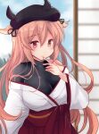  1girl asymmetrical_clothes black_shirt blurry breasts brown_eyes depth_of_field hair_flaps hakama heterochromia highres hirune_(konekonelkk) japanese_clothes kantai_collection large_breasts light_brown_hair long_hair miko murasame_(kantai_collection) official_alternate_costume red_eyes red_hakama remodel_(kantai_collection) shirt sliding_doors solo turtleneck two_side_up undershirt 