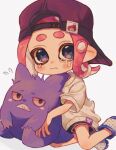  1girl backwards_hat baseball_cap black_eyes black_headwear blue_eyes closed_mouth colored_sclera colored_skin commentary_request gengar hat highres looking_at_viewer medium_hair ochocho2828 octoling octoling_girl octoling_player_character pink_hair pokemon pokemon_(creature) purple_skin red_sclera simple_background sitting splatoon_(series) tears teeth tentacle_hair thick_eyebrows wavy_mouth white_background 