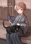  1girl androgynous animal_on_lap black_cat black_hakama blue_eyes cat cat_on_lap commentary_request dated grey_kimono hakama japanese_clothes kantai_collection kimono looking_at_viewer reading reverse_trap short_hair silver_hair sitting twitter_username unsinkable_sam veranda wss_(nicoseiga19993411) z1_leberecht_maass_(kantai_collection) 