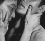  2boys black_eyes blank_stare commentary english_commentary eyes_out_of_frame greyscale hand_on_another&#039;s_face hand_on_another&#039;s_neck head_out_of_frame highres hwang_in-ho leaning_on_person male_focus monochrome multiple_boys no_shirt open_mouth seong_gi-hun squid_game teeth upper_teeth_only wildwerewolf yaoi 