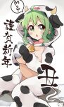  1girl animal_costume animal_ears animal_print black_gloves blush_stickers bottle chinese_zodiac commentary cow_costume cow_ears cow_hood cow_horns cow_print cow_tail gloves green_eyes green_hair gumi happy_new_year highres holding holding_bottle horns kanji medium_hair milk_bottle neck_bell new_year open_mouth pachio_(patioglass) sidelocks sitting solo speech_bubble tail translated vocaloid white_background year_of_the_ox 