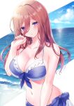  1girl absurdres bangs bare_shoulders bikini breasts cleavage collarbone commentary_request go-toubun_no_hanayome hair_between_eyes hair_over_shoulder highres long_hair looking_at_viewer midriff nakano_miku navel ocean outdoors parted_lips pontaro18 purple_eyes red_hair swimsuit two-tone_bikini 