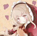  1girl :t bangs blush brown_background brown_eyes brown_hair capelet closed_mouth commentary_request eating eyebrows_visible_through_hair food food_on_face holding holding_food hood hood_up hooded_capelet little_red_riding_hood_(sinoalice) long_hair red_capelet short_eyebrows sinoalice solo thick_eyebrows tsukiyo_(skymint) upper_body 