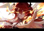  1girl arknights bangs bare_shoulders chinese_commentary commentary_request hair_between_eyes highres horns letterboxed long_hair looking_at_viewer niarwol parted_lips red_hair solo surtr_(arknights) upper_body yellow_eyes 