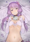  1girl bangs bare_shoulders bed_sheet blush box breasts bunny_hair_ornament commentary elbow_gloves eyebrows_visible_through_hair fingerless_gloves gift gift_box gloves grin groin hair_ornament head_tilt highres holding holding_gift kanzen_bouon long_hair looking_at_viewer lying navel on_back petals purple_eyes purple_gloves purple_hair small_breasts smile solo upper_body veil voiceroid yuzuki_yukari 