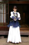  bougu foreshortening gloves hakama highres japanese_clothes kendo photo shinai solo sword weapon 
