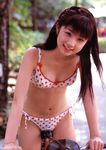  1girl asian bicycle bike brown_hair cute girl happy long_hair looking_at_viewer ogura_yuuko outdoors photo real smile solo swimsuit yukoogura 