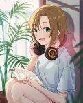  1girl absurdres adjusting_headphones bare_arms bare_legs binder_clip blurry blurry_foreground blush brown_hair commentary_request cowboy_shot curtains emu_(emum) green_eyes headphones highres holding holding_paper idolmaster idolmaster_cinderella_girls indoors looking_at_viewer open_mouth paper plant potted_plant shadow shirt short_hair short_sleeves smile solo squatting t-shirt tada_riina white_shirt 