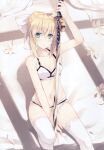  1girl absurdres artoria_pendragon_(all) bangs bare_shoulders between_legs black_bow blonde_hair blush bow bra breasts caliburn_(fate) eyebrows_visible_through_hair fate/unlimited_codes fate_(series) flower green_eyes hair_between_eyes hair_bow hand_between_legs highres holding holding_sword holding_weapon knee_up lingerie medium_breasts nagishiro_mito open_mouth panties petals saber_lily scan short_hair sitting solo sword thighhighs underwear weapon white_bra white_flower white_legwear white_panties 
