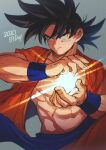  1boy 2020 abs belt black_eyes black_hair blue_belt blurry blurry_background closed_mouth collarbone cupping_hands depth_of_field dragon_ball dragon_ball_super dragon_ball_z energy_ball facing_viewer fingernails grey_background hands_up highres light light_particles light_rays looking_afar looking_to_the_side loose_belt male_focus mamefuku_(mamedehuku) muscular navel open_clothes open_shirt orange_shirt pectorals shaded_face shirt simple_background smile son_goku spiked_hair upper_body wristband 