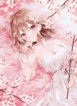  1girl bangs breasts brown_hair cherry_blossoms cleavage collarbone dress eyebrows_visible_through_hair hand_on_own_face highres looking_at_viewer lying medium_breasts medium_hair on_back original parted_lips pink_eyes see-through solo tree weri white_dress 