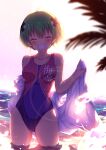  1girl ^_^ antenna_hair backlighting bangs blue_swimsuit blush breasts closed_eyes clothes_writing collarbone commentary_request covered_collarbone covered_navel eyebrows_visible_through_hair facing_viewer green_hair grin groin hair_between_eyes hair_ornament highres holding holding_towel one-piece_swimsuit original palm_tree short_hair small_breasts smile solo standing swimsuit towel translation_request tree ugume water x_hair_ornament 