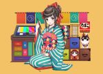  1girl bangs blue_eyes braid daruma_doll hair_bun hair_ribbon highres japanese_clothes kimono long_sleeves looking_at_viewer obi open_mouth original red_ribbon ribbon sash seiza sidelocks sitting smile solo striped striped_kimono usamochi. wide_sleeves yellow_background 