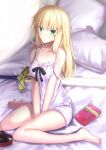  1girl alternate_costume alternate_hairstyle artoria_pendragon_(all) bed blonde_hair box breasts collarbone excalibur_(fate/stay_night) fate/grand_order fate_(series) gift gift_box green_eyes hair_down highres long_hair looking_at_viewer neko_daruma nightshirt on_bed pillow saber shirt shorts sitting sitting_on_bed small_breasts solo strap_slip sword valentine wariza weapon white_shirt white_shorts 