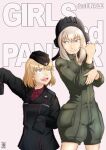  2girls arm_up artist_name background_text bangs black_headwear black_jacket blonde_hair blue_eyes bob_cut commentary_request copyright_name cosplay costume_switch dress_shirt fang fox_shadow_puppet garrison_cap girls_und_panzer girls_und_panzer_saishuushou green_jumpsuit grin hat helmet highres insignia itsumi_erika jacket jumpsuit katyusha_(girls_und_panzer) kuromorimine_military_uniform long_sleeves looking_at_another medium_hair military military_hat military_uniform multiple_girls nishi_itsumi open_mouth oversized_clothes partial_commentary pravda_military_uniform red_shirt shirt short_hair short_jumpsuit silver_hair sleeves_past_fingers sleeves_past_wrists smile tank_helmet uniform wing_collar 