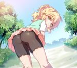  1girl ass bike_shorts black_shorts blonde_hair blue_shirt from_behind fuu_(koneko_no_yomeiri) green_eyes highres idolmaster idolmaster_cinderella_girls kneepits long_hair looking_at_viewer looking_back outdoors pink_skirt ponytail sakurai_momoka scrunchie shirt short_sleeves shorts shorts_under_skirt skirt skirt_lift sly smile solo thighs tree 