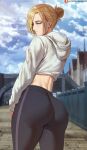  1girl annie_leonhardt ass blonde_hair blue_eyes cloud cloudy_sky commentary from_behind highres hood hoodie looking_at_viewer pants shexyo shingeki_no_kyojin short_hair sky solo tied_hair yoga_pants 