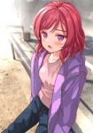  1girl :o bangs black_pants blush eyebrows_visible_through_hair fushimi_asuha highres jacket long_sleeves looking_at_viewer love_live! love_live!_school_idol_project medium_hair nishikino_maki open_clothes open_jacket open_mouth outdoors pants pink_shirt purple_eyes purple_jacket railing red_eyes road sand shirt sitting_on_railing sunlight 