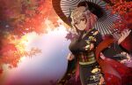  1girl a-uto alternate_costume autumn_leaves azur_lane breasts brown_flower brown_kimono flower hair_flower hair_ornament headgear holding holding_umbrella japanese_clothes kimono large_breasts leaf light_brown_hair looking_at_viewer maple_leaf medium_hair multicolored_hair oil-paper_umbrella outdoors red_hair roon_(azur_lane) sash solo streaked_hair two-tone_hair umbrella wide_sleeves 
