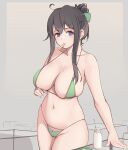  1girl ahoge bikini black_hair blue_eyes bottle bow breasts collarbone eyebrows_visible_through_hair folait green_bikini green_bow grey_background hair_bow highres large_breasts looking_at_viewer milk milk_bottle mouth_hold navel original swimsuit 