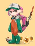  1girl absurdres baseball_cap boots closed_mouth commission full_body gloves golden_egg_(splatoon) green_boots green_gloves hat highres inkling inkling_girl inkling_player_character jumpsuit lifebuoy orange_jumpsuit pink_hair pointy_ears print_headwear puchiman rubber_boots rubber_gloves salmon_run_(splatoon) salmonid second-party_source short_hair simple_background smallfry_(splatoon) smile solo splashtag_(splatoon) splatoon_(series) splatoon_3 standing swim_ring tentacle_hair thick_eyebrows yellow_background 