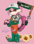  1girl absurdres baseball_cap boots closed_mouth commission full_body gloves golden_egg_(splatoon) green_boots green_gloves gun hat highres holding holding_gun holding_weapon inkling inkling_girl inkling_player_character jumpsuit lifebuoy looking_at_viewer orange_jumpsuit pink_background pink_eyes pink_hair pointy_ears print_headwear puchiman rubber_boots rubber_gloves salmon_run_(splatoon) salmonid second-party_source short_hair simple_background smallfry_(splatoon) smile solo splashtag_(splatoon) splatoon_(series) splatoon_3 sploosh-o-matic_(splatoon) standing swim_ring tentacle_hair thick_eyebrows weapon 