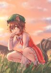  1girl :p animal_ears bangs blurry blush bow bowtie brown_eyes brown_hair cat_ears cat_tail chen cloud cloudy_sky commentary_request depth_of_field dress eyebrows_visible_through_hair flat_chest forneus_0 full_body gold_trim grass green_headwear hair_between_eyes hand_up hat highres jewelry licking long_sleeves looking_at_viewer mob_cap multiple_tails nekomata outdoors paw_pose petticoat red_dress short_hair single_earring sky solo squatting tail tongue tongue_out touhou twilight two_tails white_bow white_neckwear 
