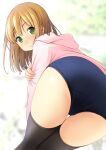  1girl ass bangs bent_over black_legwear blonde_hair blue_swimsuit blurry blurry_background blush closed_mouth commentary_request depth_of_field drawstring eyebrows_visible_through_hair from_behind green_eyes highres hood hood_down hoodie long_sleeves looking_at_viewer looking_back original pink_hoodie school_swimsuit shibacha solo swimsuit swimsuit_under_clothes thighhighs 
