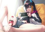  1girl aqua_eyes bangs bare_legs barefoot black_hair black_shirt blurry blurry_foreground blush bottle coca-cola cola commentary_request cushion display displayer eyebrows_visible_through_hair feet foot_out_of_frame fukai_ryosuke grey_shorts handheld_game_console holding holding_handheld_game_console jacket legs long_sleeves medium_hair midriff multicolored_hair navel nintendo_switch open_mouth orange_hair puffy_long_sleeves puffy_sleeves rinka_raizenbain shirt short_shorts shorts sitting solo streaked_hair sweatdrop two-tone_jacket virtual_youtuber 