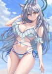  1girl absurdres ahoge alternate_costume animal_ear_fluff animal_ears beach bikini blue_archive breasts broken_halo cross cross_hair_ornament dark_halo extra_ears frilled_bikini frills grey_hair hair_ornament halo highres inverted_cross large_breasts mismatched_pupils multi-strapped_bikini_bottom shiroko_terror_(blue_archive) side-tie_bikini_bottom smile swimsuit white_bikini wolf_ears wolf_girl yebiyong_cream_bun 