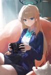  1girl absurdres animal aqua_bow aqua_bowtie blonde_hair blue_archive blue_cardigan blue_eyes blue_halo bow bowtie camera cardigan cat closed_mouth collared_shirt commentary_request halo highres holding holding_camera jianjia long_hair official_alternate_costume shirt sitting solo toki_(blue_archive) toki_(school_uniform)_(blue_archive) white_shirt 