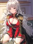  1girl aiguillette azur_lane bangs between_legs black_dress black_legwear blunt_bangs blush braid breasts buran_(22x) cape cleavage closed_mouth commentary_request dress epaulettes eyebrows_visible_through_hair gloves green_cape grey_eyes grey_hair hair_intakes hand_between_legs highres indoors jacket large_breasts long_hair long_sleeves looking_at_viewer medallion on_bed partial_commentary pillow pleated_dress red_jacket sidelocks sitting sitting_on_bed smile solo thighhighs very_long_hair vittorio_veneto_(azur_lane) wariza white_gloves zettai_ryouiki 