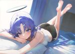  1girl absurdres alternate_costume ass bare_legs bare_shoulders barefoot bed_sheet black_shorts blue_archive blue_eyes blue_hair blush closed_mouth commentary damcheong dolphin_shorts feet feet_up halo highres indoors legs long_hair looking_at_viewer lying mechanical_halo on_bed on_stomach pillow red_pupils shorts soles solo tank_top the_pose toes white_tank_top yuuka_(blue_archive) 