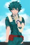  1boy arm_support biting bodysuit boku_no_hero_academia eye_contact facing_viewer finger_biting finger_in_mouth freckles gloves green_bodysuit green_hair looking_at_another looking_at_viewer madelegencia male_focus midoriya_izuku naughty_face short_hair simple_background solo source_request torn_clothes white_gloves 
