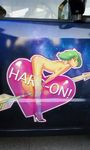  arrow arrow_through_heart ass bent_over breasts car green_hair ground_vehicle heart high_heels itasha macross macross_frontier medium_breasts motor_vehicle nude official_art photo ranka_lee sexually_suggestive shoes solo sticker thighhighs 