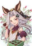  1girl animal_ears candy chocolate chocolate_bar erune food granblue_fantasy highres legendpoon long_hair red_eyes scathacha_(granblue_fantasy) smile solo valentine white_hair 