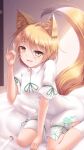  1girl :d animal_ear_fluff animal_ears bangs blonde_hair blush commentary_request eyebrows_visible_through_hair fox_ears fox_girl fox_shadow_puppet fox_tail highres indoors jumpsuit kudamaki_tsukasa looking_at_viewer lzh no_shoes open_mouth short_hair short_sleeves sitting smile socks solo tail test_tube touhou wariza white_legwear yellow_eyes 