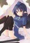  1girl bird_wings black_legwear black_wings blue_dress blue_headwear blurry blurry_foreground blush breasts commentary_request dark_blue_hair dress hair_between_eyes hand_on_own_knee hat highres iizunamaru_megumu kanpa_(campagne_9) knees_up looking_at_viewer medium_breasts medium_hair neck_ribbon open_mouth panties pointy_ears pom_pom_(clothes) red_eyes ribbon sitting solo star_(symbol) thighhighs tokin_hat touhou tripod underwear white_neckwear white_panties white_ribbon wings 